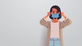Woman wearing face protective mask against corona virus covid-19 protection stop coronavirus pandemic
