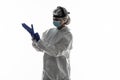 Woman wearing gloves with biohazard chemica protective suit isolated on white background