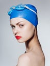 woman wearing goggles and swimming cap sport fitness lifestyle pool Royalty Free Stock Photo