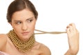 Woman wearing golden necklace Royalty Free Stock Photo