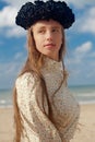 Woman beach black rose crown, De Panne, Belgium Royalty Free Stock Photo