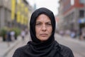 Woman wearing a head scarf in an urban street Royalty Free Stock Photo