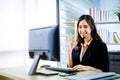 Woman wearing headset working in customer care support service Professional helpline call center agent operator Royalty Free Stock Photo