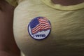 Woman wearing an I voted sticker on election day Royalty Free Stock Photo