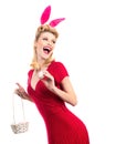 Woman wearing a mask Easter bunny and looks very sensually. model dressed in costume Easter bunny. Hunting eggs