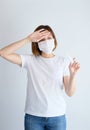 Woman wearing mask get sick from corona virus, covid19, flu symptom as sneezing, cough, fever, body ache, breathing , pain Royalty Free Stock Photo