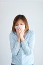 Woman wearing mask get sick from corona virus,, flu symptom as sneezing, cough, fever, body ache, breathing , pain Royalty Free Stock Photo