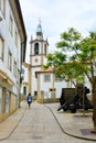 Woman Wearing Mask and Walking on Empty Street, Old Town Castle, Valenca, Portugal