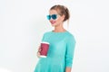 Woman wearing mint blue sunglasses and top with messy hairstyle, smiling. Portrait of fit blond glamorous female model Royalty Free Stock Photo