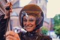 A woman wearing a moto helmet. Royalty Free Stock Photo