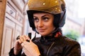 A woman wearing a moto helmet. Royalty Free Stock Photo