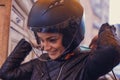 A woman wearing a moto helmet. Royalty Free Stock Photo