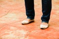 A woman wearing a pair of flat shoes at the park Royalty Free Stock Photo