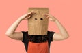 Woman wearing paper bag over her head Royalty Free Stock Photo