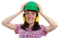 Woman wearing protective helmet and headphones Royalty Free Stock Photo