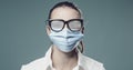 Woman wearing a surgical mask and fogged up glasses Royalty Free Stock Photo