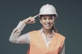 Woman wearing protective workwear and safety helmet Royalty Free Stock Photo