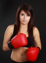 Woman wearing red boxing glove Royalty Free Stock Photo