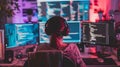 Woman at Computer Screens in Vibrant Digital Workspace