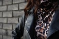 Woman wearing Rock and roll leather jacket. Closeup shot. Selective foucus on the details Royalty Free Stock Photo
