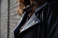 Woman wearing Rock and roll leather jacket. Closeup shot. Selective foucus on the details Royalty Free Stock Photo