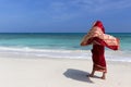 Woman wearing a sari on paradise beach. Royalty Free Stock Photo