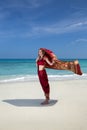 Woman wearing a sari on paradise beach. Royalty Free Stock Photo