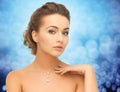 Woman wearing shiny diamond pendant Royalty Free Stock Photo