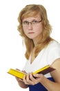 Woman wearing spectacles reads book