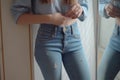 Woman wearing stylish high waist jeans. Generate ai