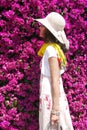 Woman smelling Bougainvillea blossoms Summer outdoor Royalty Free Stock Photo