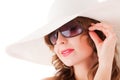 Woman wearing sun glasses and straw hat Royalty Free Stock Photo