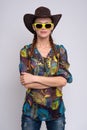 Woman wearing sunglasses and cowboy hat Royalty Free Stock Photo