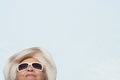 Woman wearing a sunhat and sunglasses Royalty Free Stock Photo