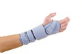 Woman Wearing Supportive Wrist Brace in Studio