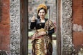 Woman wearing traditional Balinese dress with thumbs up Royalty Free Stock Photo