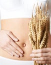 Close Up Of Woman Wearing Underwear Holding Bundle Of Wheat And Royalty Free Stock Photo