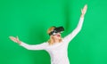 Woman wearing virtual reality goggles. Excited smiling businesswoman wearing virtual reality glasses. Person with