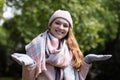 woman wearing warm clothing making gesture about weather Royalty Free Stock Photo