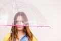 Woman wearing waterproof coat holding umbrella Royalty Free Stock Photo