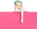 Woman wearing white tights and stylish shoes sitting on color background, closeup Royalty Free Stock Photo