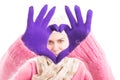 Woman wearing winter clothes showing hearth shape Royalty Free Stock Photo