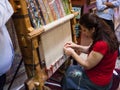 Woman weave carpet in workshop in Istanbul