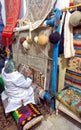 Woman Weaves a Traditional Carpet by hand in Kairouan, Tunisia