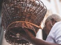 Woman with a weaving basket at the religious Mass of Santo Antonio de Categero in Salvador,Bahia