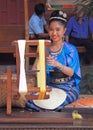 Woman is weaving outdoor, Bangkok, Thailand