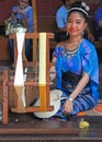 Woman is weaving outdoor, Bangkok, Thailand