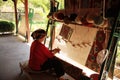 Woman weaving a Turkish rug