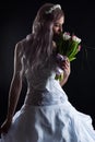 Woman in wedding dress smelling Royalty Free Stock Photo