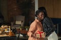 Woman Welcoming Friend to Dinner Party Royalty Free Stock Photo